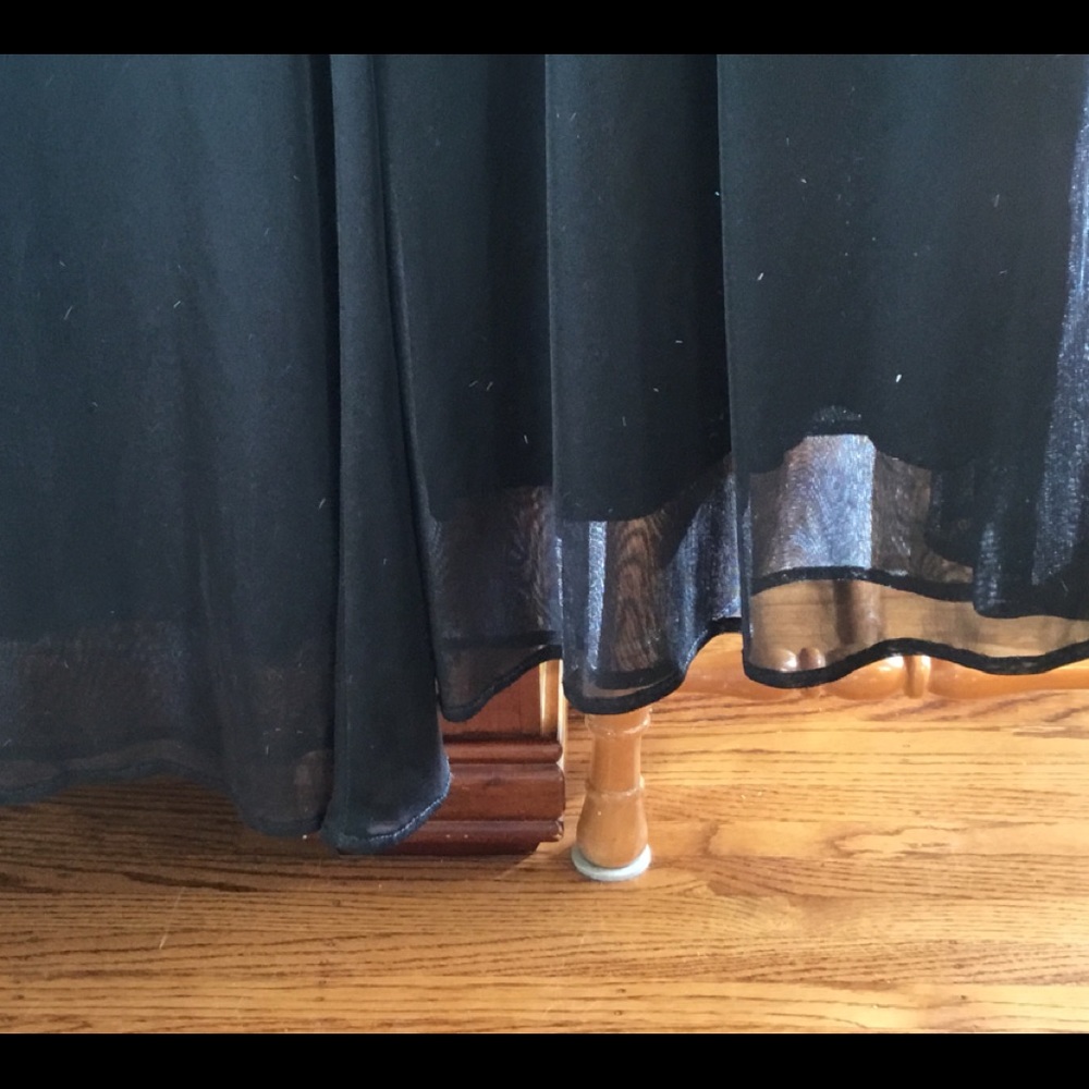 Elastic waste lined dress paints with bell bottom legs .